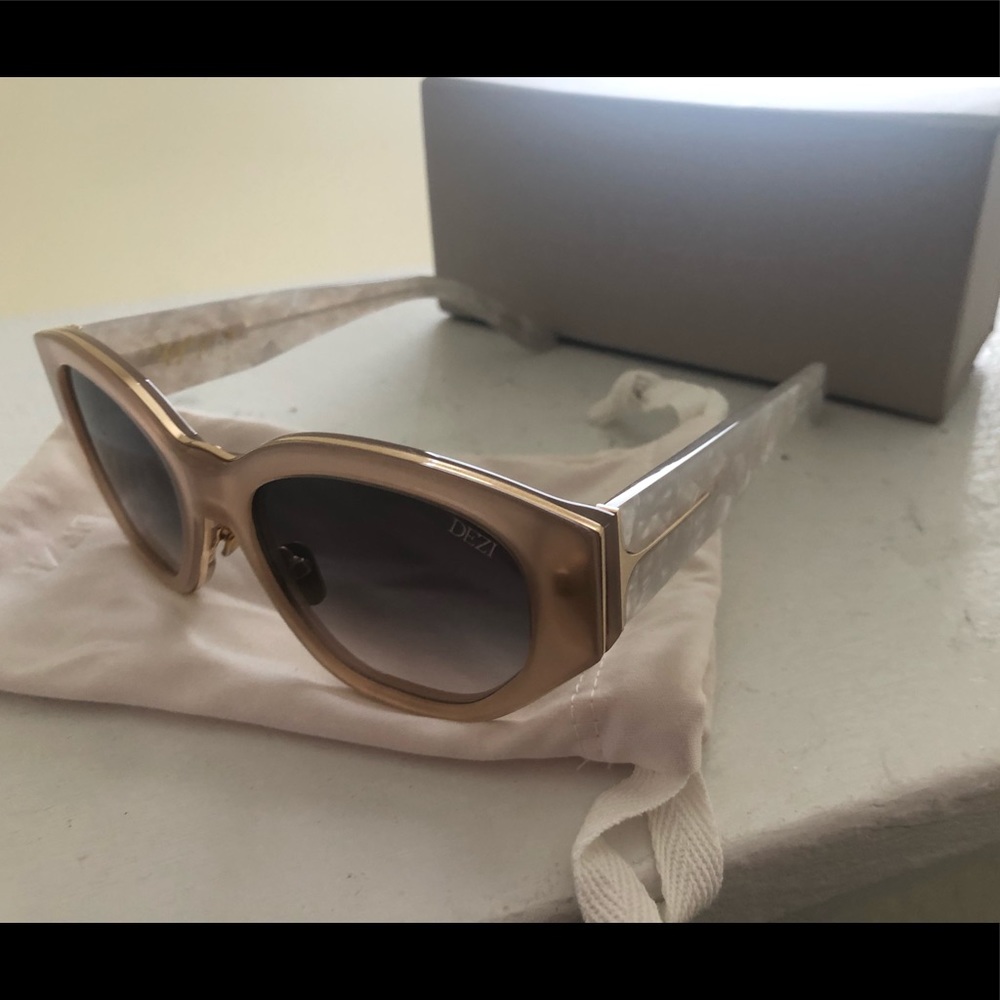 Dezi brand sunglasses. Brand new comes with case.